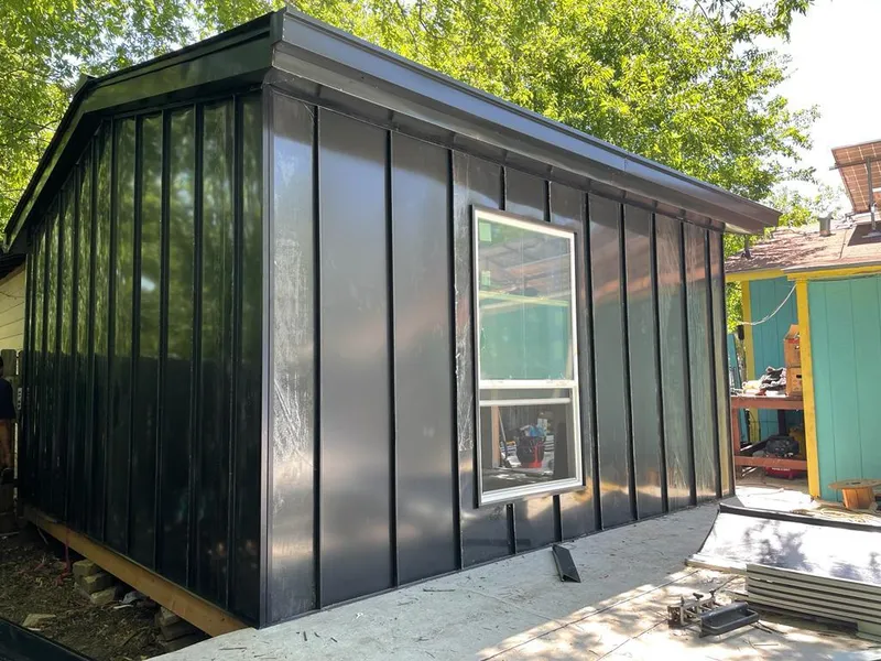 Black standing seam metal wall panels for Metal Roof Installation in University Park
