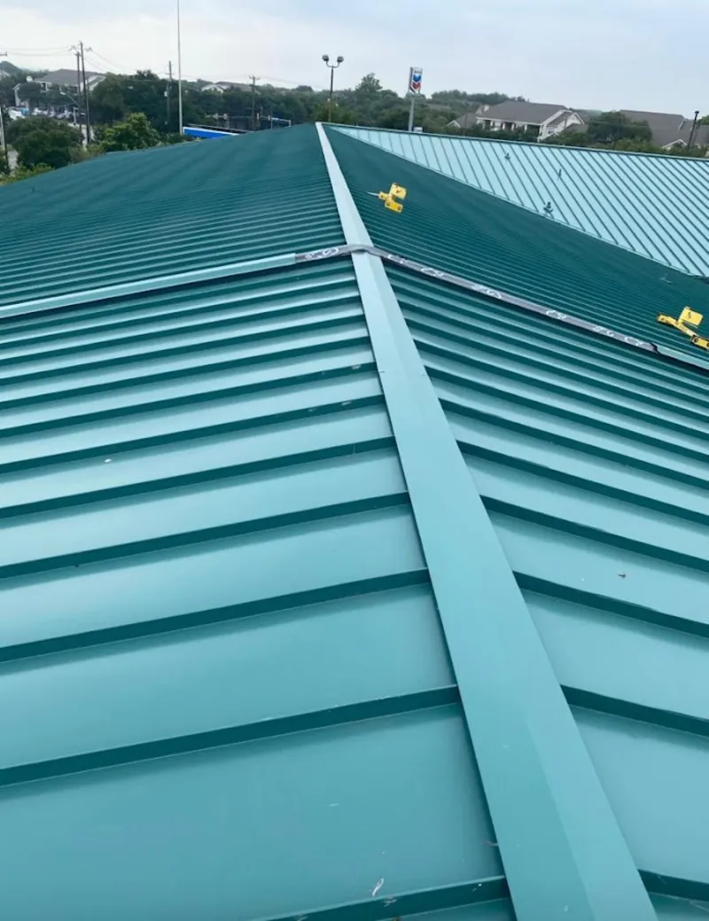 Green commercial metal roof ridge and valley for Metal Roof Repair in University Park